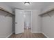 Small bathroom with toilet and wood-look floors at 7930 E Camelback Rd # 506, Scottsdale, AZ 85251