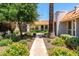 Landscaped walkway leading to a charming home at 7113 E Mcdonald Dr, Paradise Valley, AZ 85253