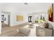 Bright and airy living room with light flooring and large windows at 7113 E Mcdonald Dr, Paradise Valley, AZ 85253