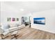 Spacious den with comfortable seating, a large TV, and built-in shelving at 7113 E Mcdonald Dr, Paradise Valley, AZ 85253