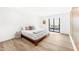 Light and bright bedroom with sliding glass door to patio at 7113 E Mcdonald Dr, Paradise Valley, AZ 85253