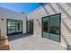 Outdoor patio with sliding glass doors leading to the interior at 7113 E Mcdonald Dr, Paradise Valley, AZ 85253