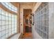 Spa-like bathroom with glass block shower and a bench at 10282 N 103Rd Pl, Scottsdale, AZ 85258