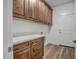 Laundry room with ample cabinetry and countertop space at 47616 N 23Rd Dr, New River, AZ 85087