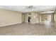 Open living room with kitchen and backyard access at 30200 N Desert Willow Blvd, San Tan Valley, AZ 85143