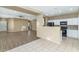 Kitchen with white cabinets and granite countertops at 30200 N Desert Willow Blvd, San Tan Valley, AZ 85143
