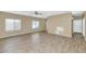 Living room with wood-look floors and neutral walls at 30200 N Desert Willow Blvd, San Tan Valley, AZ 85143