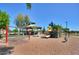 playground with swings, slides, and a covered area at 30200 N Desert Willow Blvd, San Tan Valley, AZ 85143