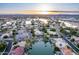Wide aerial view of waterfront homes and community at sunset at 1920 E Schooner Ct, Gilbert, AZ 85234