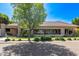 Ranch style home with large windows and mature landscaping at 1920 E Schooner Ct, Gilbert, AZ 85234