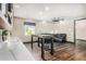 Game room features a wet bar, seating area, and hardwood floors at 1920 E Schooner Ct, Gilbert, AZ 85234