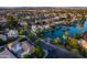 Aerial view showcasing a waterfront home and surrounding neighborhood at 1920 E Schooner Ct, Gilbert, AZ 85234