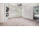 Bright bedroom with built-in fireplace and large windows at 1920 E Schooner Ct, Gilbert, AZ 85234
