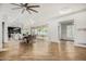 Modern dining room with wood floors, access to a patio, and open views to the kitchen at 1920 E Schooner Ct, Gilbert, AZ 85234