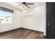 Bright bedroom with hardwood floors and window coverings at 1920 E Schooner Ct, Gilbert, AZ 85234