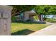 House exterior with lush landscaping and driveway at 1920 E Schooner Ct, Gilbert, AZ 85234