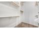 Large walk-in closet with ample shelving and hanging space at 1920 E Schooner Ct, Gilbert, AZ 85234