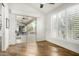 Bright office with wood floors, large windows with plantation shutters and access to a patio at 1920 E Schooner Ct, Gilbert, AZ 85234