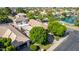 Aerial view showcasing house and lakefront location at 1920 E Schooner Ct, Gilbert, AZ 85234
