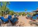 Inviting community patio with blue cushioned seating at 11500 E Cochise Dr # 2011, Scottsdale, AZ 85259
