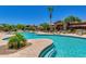Community swimming pool with surrounding landscaping at 11500 E Cochise Dr # 2011, Scottsdale, AZ 85259