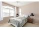 Comfortable bedroom with a queen bed and a large window at 11500 E Cochise Dr # 2011, Scottsdale, AZ 85259