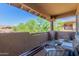 Private patio with wicker furniture and lovely views at 11500 E Cochise Dr # 2011, Scottsdale, AZ 85259