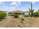 Large backyard with desert landscaping and a large cactus at 6832 E Stevens Rd, Cave Creek, AZ 85331