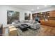 Home office with built-in shelving, comfortable seating and natural light at 9673 E Oberlin Way # 15, Scottsdale, AZ 85262
