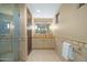 Bathroom with single vanity and a walk-in shower at 9673 E Oberlin Way # 15, Scottsdale, AZ 85262