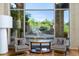 Relaxing sitting area with stunning views and comfortable armchairs at 9673 E Oberlin Way # 15, Scottsdale, AZ 85262