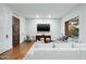 Cozy Gathering room with comfortable seating and a large TV at 9673 E Oberlin Way # 15, Scottsdale, AZ 85262