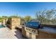 Stainless steel built-in grill with mountain views at 9673 E Oberlin Way # 15, Scottsdale, AZ 85262