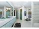 Elegant bathroom with double vanity, soaking tub, and glass shower at 9673 E Oberlin Way # 15, Scottsdale, AZ 85262