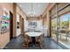 Bright kitchen with an eat-in area and access to the backyard at 9673 E Oberlin Way # 15, Scottsdale, AZ 85262