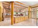 Large kitchen island, wood cabinets, and high ceilings at 6964 E Redbird Rd, Scottsdale, AZ 85266
