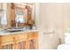 Elegant bathroom with granite countertop and wooden cabinets at 6964 E Redbird Rd, Scottsdale, AZ 85266