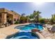 Inviting pool and spa surrounded by a landscaped backyard oasis at 6964 E Redbird Rd, Scottsdale, AZ 85266