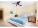 Bright bedroom with a plush bed and elegant wooden nightstands at 6964 E Redbird Rd, Scottsdale, AZ 85266