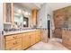 Elegant bathroom with double vanity, granite countertop, and walk-in shower at 6964 E Redbird Rd, Scottsdale, AZ 85266