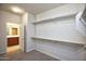 Large walk-in closet featuring ample shelving and hanging space at 21853 N 261St Ave, Buckeye, AZ 85396