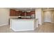 Spacious kitchen with granite countertops, stainless steel appliances, and ample cabinetry at 21853 N 261St Ave, Buckeye, AZ 85396