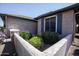 Side yard with drought-tolerant landscaping at 21853 N 261St Ave, Buckeye, AZ 85396