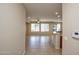 View of the living room from the entryway at 21853 N 261St Ave, Buckeye, AZ 85396