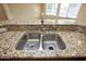 Double stainless steel sink with granite countertop at 21853 N 261St Ave, Buckeye, AZ 85396
