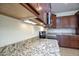 Modern kitchen with granite countertops and stainless steel appliances at 21853 N 261St Ave, Buckeye, AZ 85396