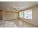 Bright dining room with tile flooring and large windows at 21853 N 261St Ave, Buckeye, AZ 85396