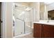Bathroom with shower, vanity and tile floor at 21853 N 261St Ave, Buckeye, AZ 85396