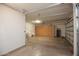 Garage with storage cabinets and workbench at 21853 N 261St Ave, Buckeye, AZ 85396
