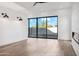 Living room with sliding glass doors and a fireplace at 8509 S 10Th Ln # 23, Phoenix, AZ 85041